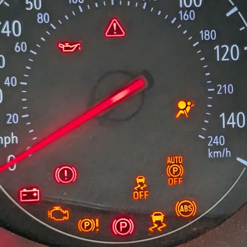 Dashboard with several warning lights on